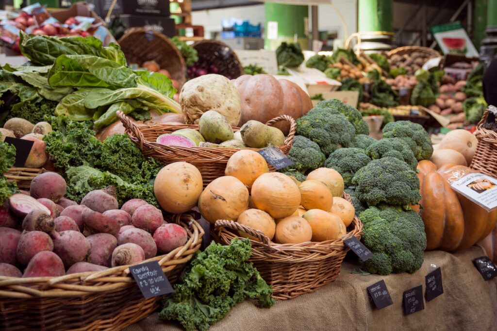 Farmshop produce, fresh fruit and vegetables on a market table.