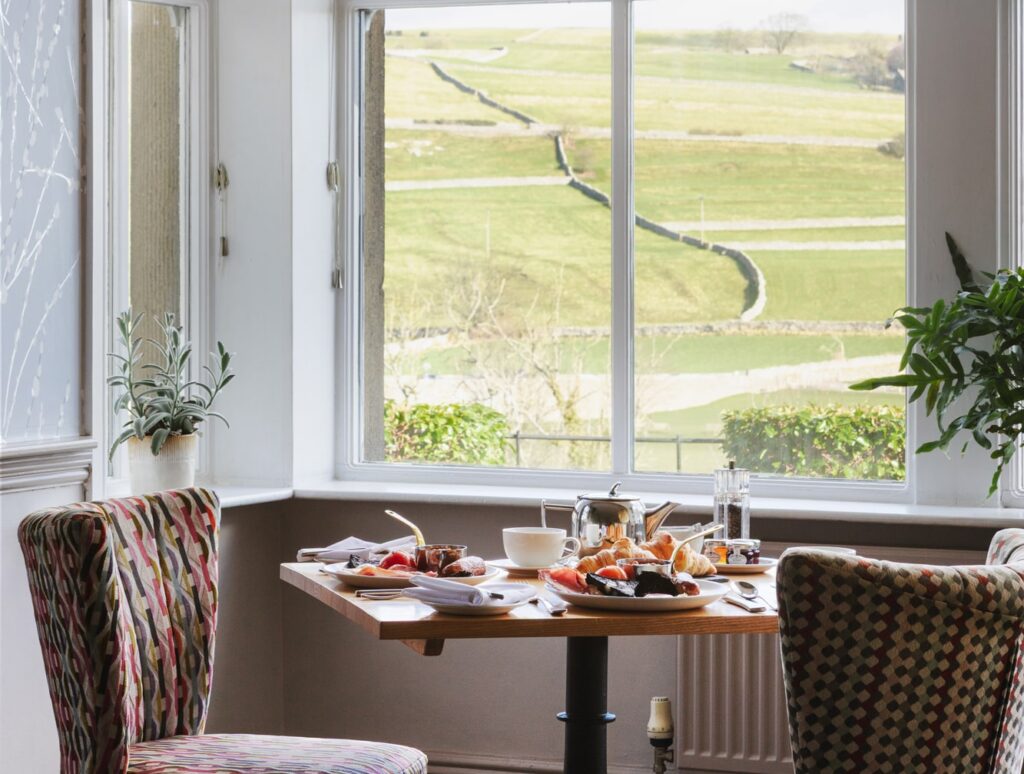 Breakfast table with a view of hills