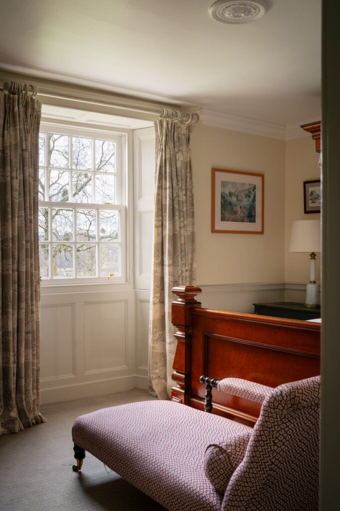 View out the window in the bedroom, looking out toward the garden and valley.