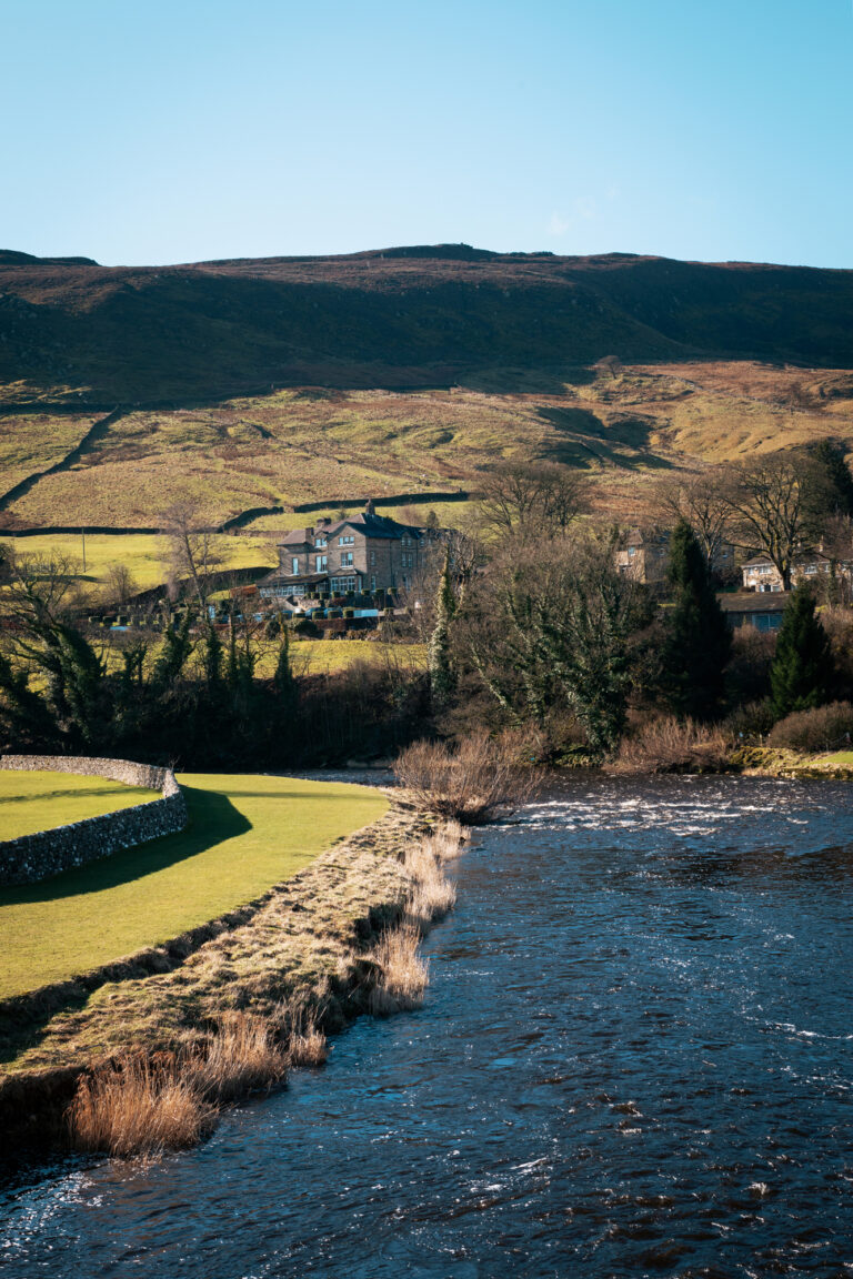 The hotel sits within the hill side overlooking the river Wharfe, with the lush green trees and landscape surrounding it.