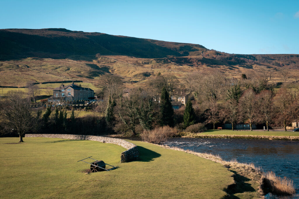 The hotel sits within the hill side overlooking the river Wharfe, with the lush green trees and landscape surrounding it.