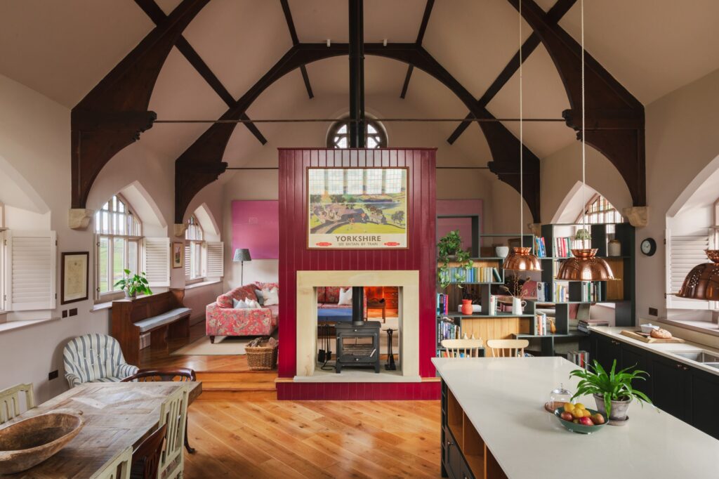 Open-plan living and dining area with beamed ceiling