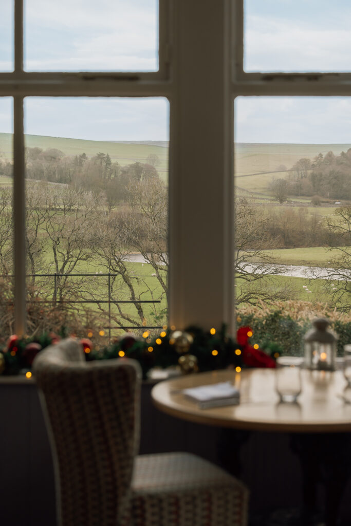 Christmas wreath with a view out to the countryside