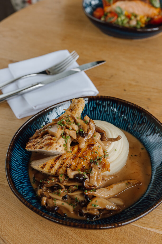Chargrilled Chicken Breast, Served on a bed of mashed potato & jus